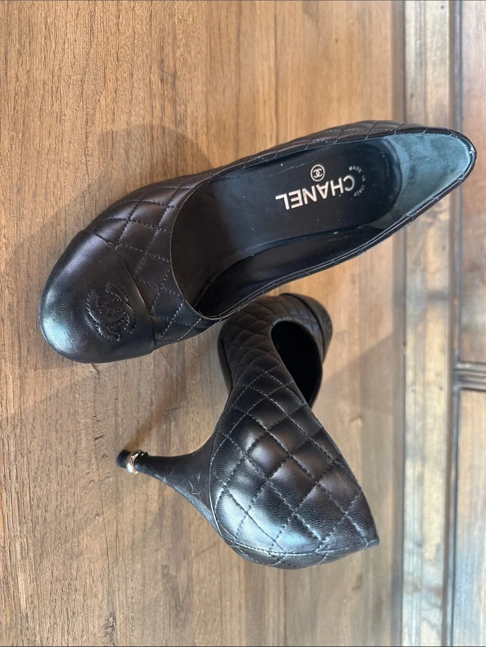 CHANEL Black Quilted Leather Stiletto Pumps with CC Cap
